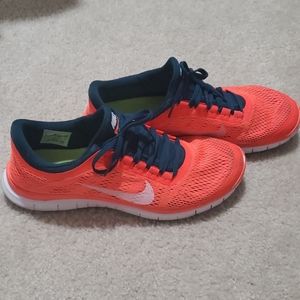 Bright orange Nike Free 3.0